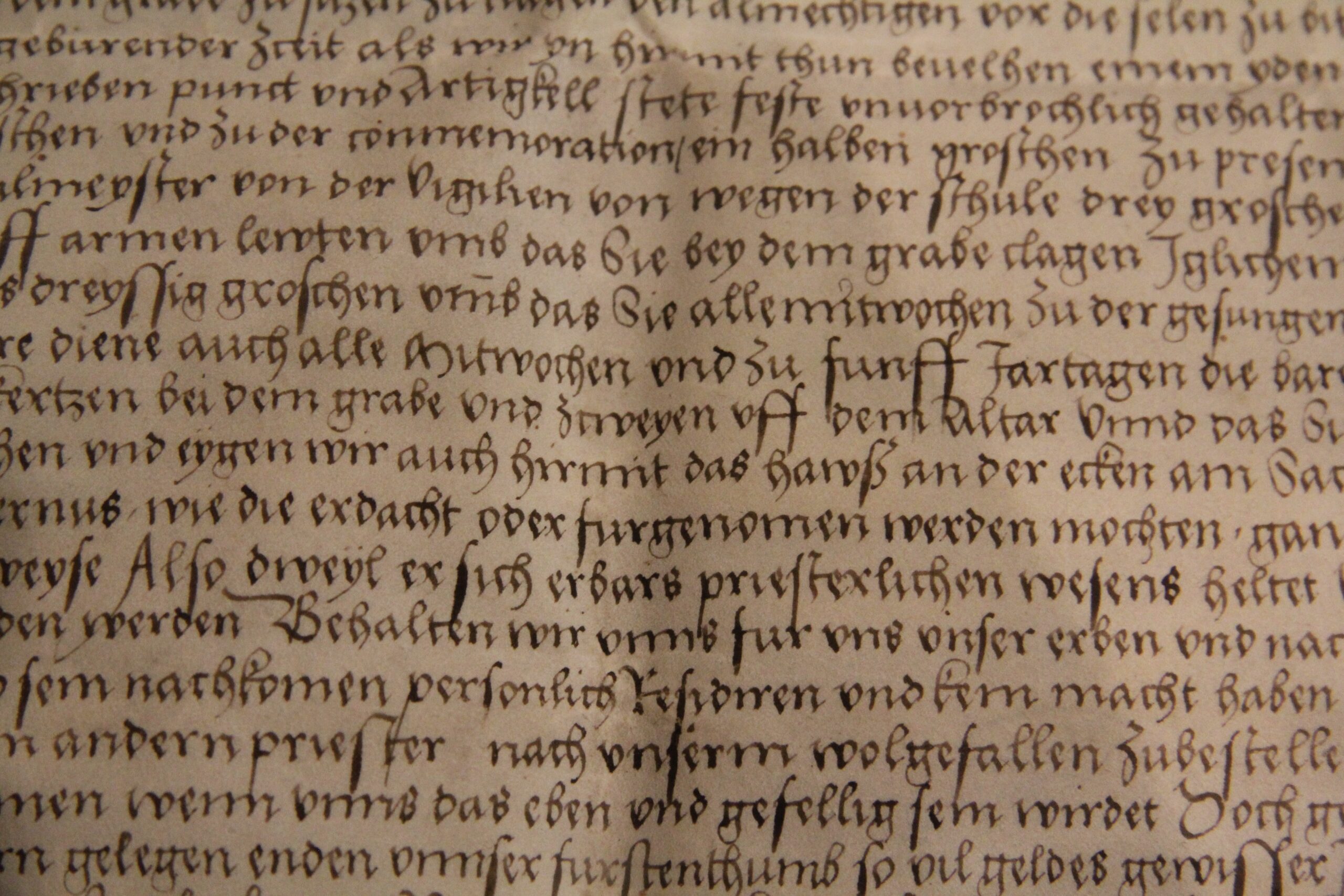 Image of handwritten, old text on yellowing parchment. The language is unclear, but it looks to be medieval or even older. 